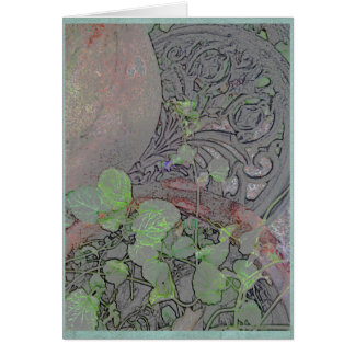 Clay pot and wrought iron in a garden