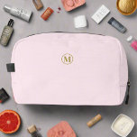 Clean Blush Pink Gold l Elegant Feminine Monogram  Dopp Kit<br><div class="desc">Introducing our Clean Blush Pink Gold Elegant Feminine Monogram Dopp Kit, a refined and chic essential for your travel needs. Crafted with a delicate blush pink hue accented by luxurious gold details, this dopp kit exudes elegance and femininity. Personalise it with your monogram for a touch of individuality and sophistication....</div>