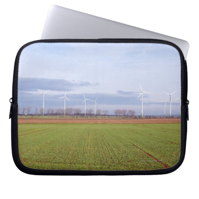 Clean energy by many wind turbines on fields. laptop sleeve (Front)