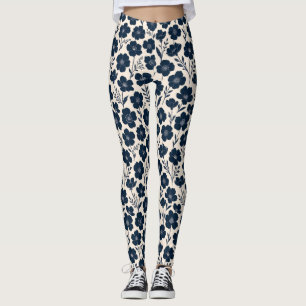 Clean monochrome wildflowers in navy on cream leggings