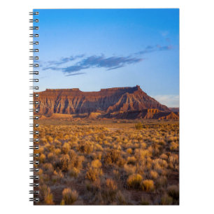 clear blue sky covers gorgeous brown hill notebook
