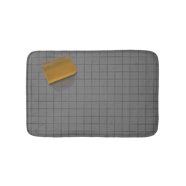 Clear Orange Soap on a Grey Tile Floor Bath Mat (Front)