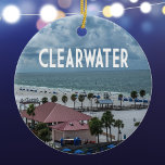 Clearwater Florida photo of beach Ceramic Ornament<br><div class="desc">Clearwater,  Florida,  beach scene photo with beautiful clouds over the ocean,  palm trees,  and the name Clearwater at the top in white. Celebrate this beautiful vacation spot near Tampa Bay with a keepsake ornament.</div>