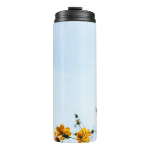 Close shot of yellow flowers thermal tumbler