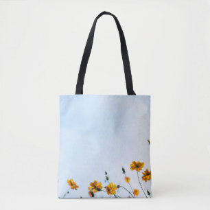 Close shot of yellow flowers tote bag