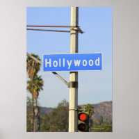 Close-up of a blue street sign on a lamppost