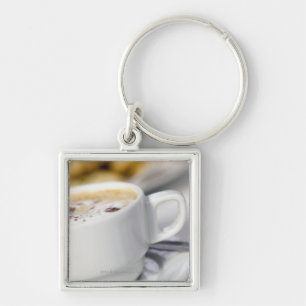 Close-up of a cup of coffee key ring