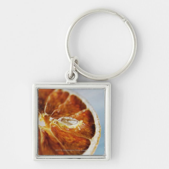 Close-up of a dried slice of lemon key ring (Front)
