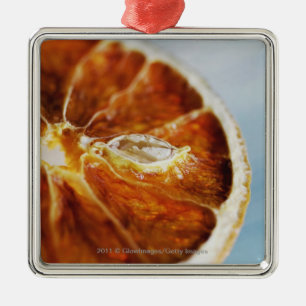 Close-up of a dried slice of lemon metal ornament