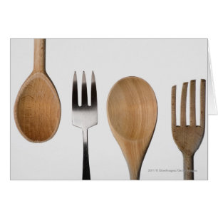 Close-up of a fork with a wooden spoon
