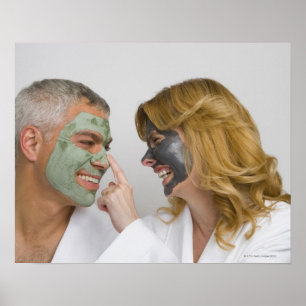 Close-up of a mature couple wearing facial masks poster