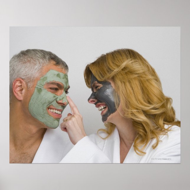 Close-up of a mature couple wearing facial masks poster (Front)