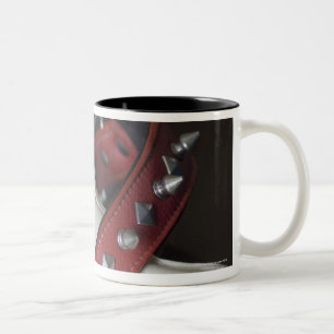 Close-up of a pet collar and a dog bone Two-Tone coffee mug