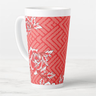 Close-up of a red and black patterned fabric, fe latte mug