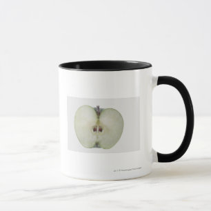 Close-up of a sliced granny smith apple mug