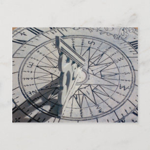 Close-up of a sundial postcard