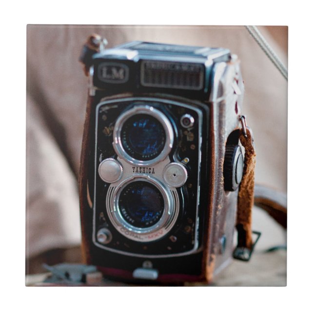Close-up of an antique camera ceramic tile (Front)