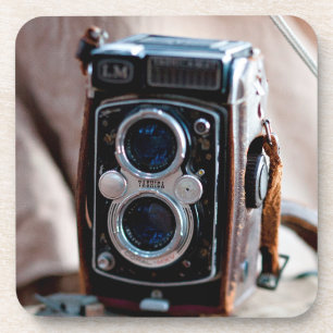 Close-up of an antique camera coaster
