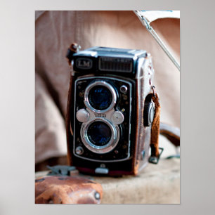 Close-up of an antique camera poster