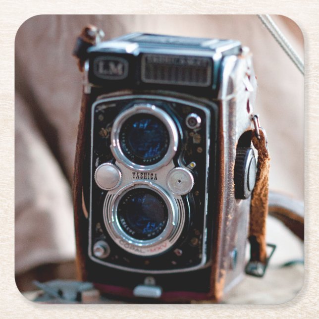 Close-up of an antique camera square paper coaster (Front)