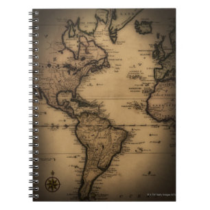 Close up of antique world map notebook