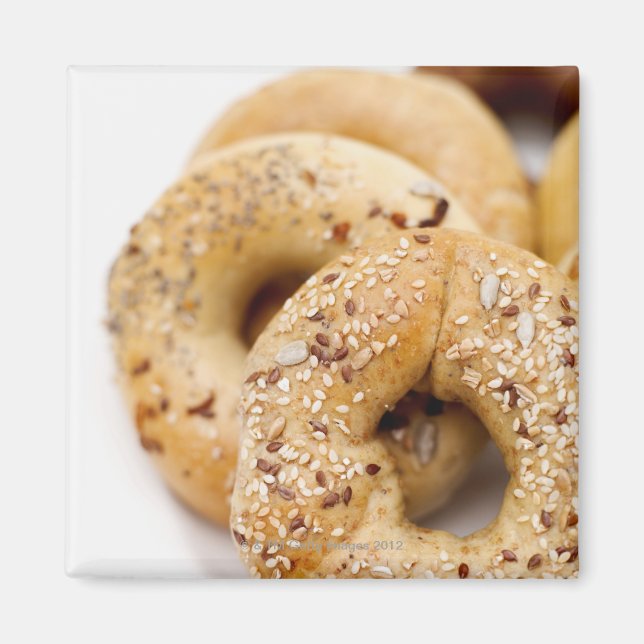 Close-up of assorted bagels on a plate magnet (Front)