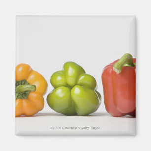 Close-up of bell peppers in a row magnet