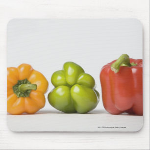 Close-up of bell peppers in a row mouse pad