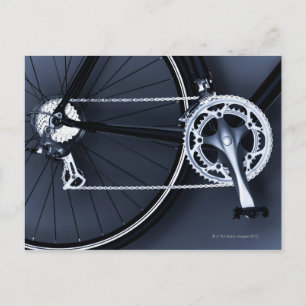 Close up of bicycle chain, pedal and gears postcard