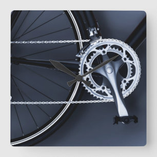 Close up of bicycle chain, pedal and gears square wall clock