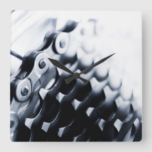 Close up of bicycle gears square wall clock