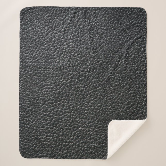 Close up of black leather texture and backgroundle sherpa blanket (Front)