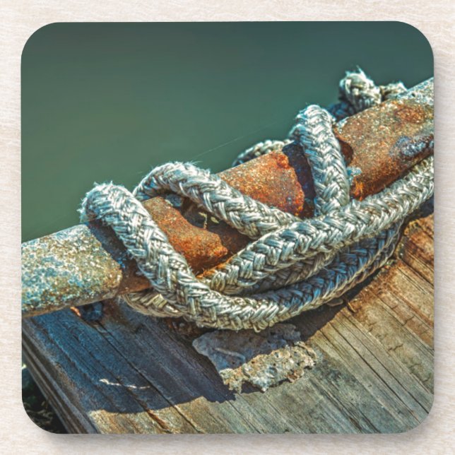 Close-up of boat cleat and rope coaster (Front)