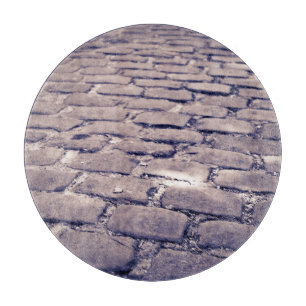 Close Up Of Cobblestone Street Cutting Board
