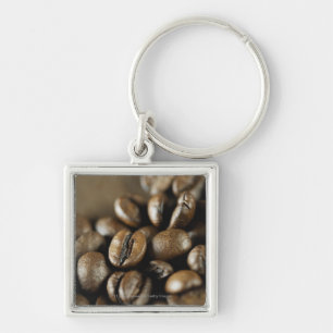 Close-up of coffee beans key ring