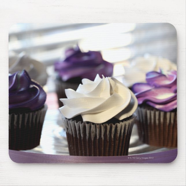 Close-up of cupcakes with selective focus on mouse pad (Front)