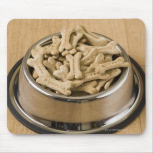 Close-up of dog biscuits in a dog bowl mouse pad