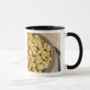 Close-up of dog food in a dog bowl mug
