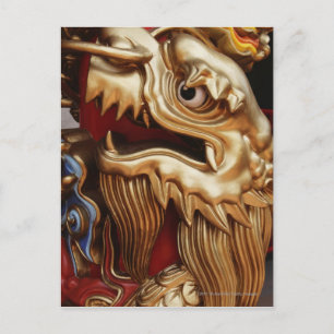Close up of gold dragon on temple pillar postcard