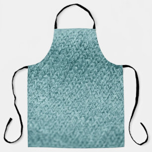 Close up of green knitted textured background.  apron