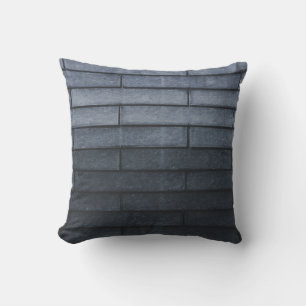 Close-up of grey brick wall cushion