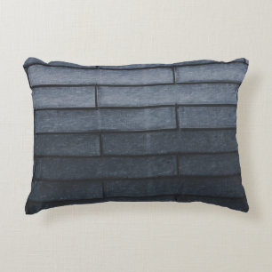 Close-up of grey brick wall decorative cushion