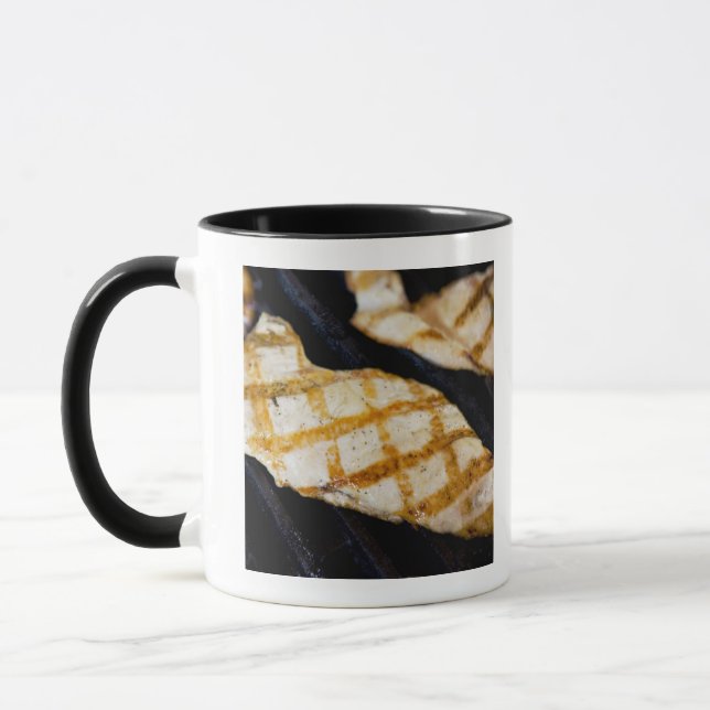 Close-up of grilled chicken breasts mug (Left)