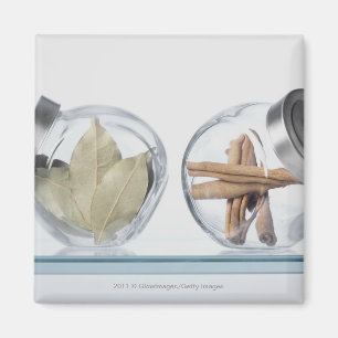 Close-up of herbs in two jars magnet