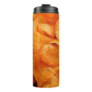 Close up of juicy, crispy, chips on black plate. thermal tumbler