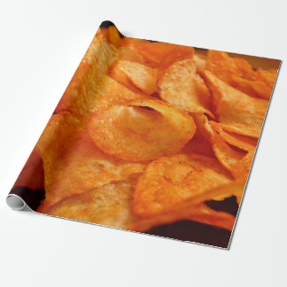 Close up of juicy, crispy, chips on black plate. wrapping paper