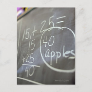 Close up of math problem on the chalkboard of an postcard