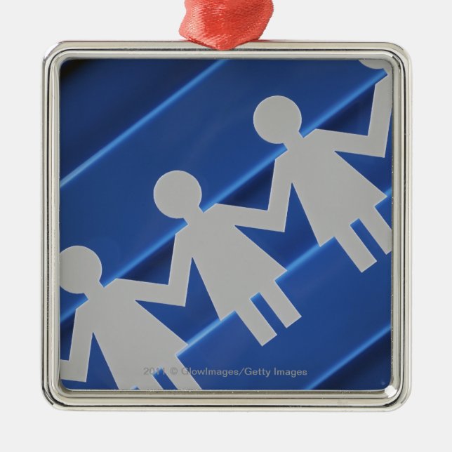 Close-up of paper chain dolls metal ornament (Front)