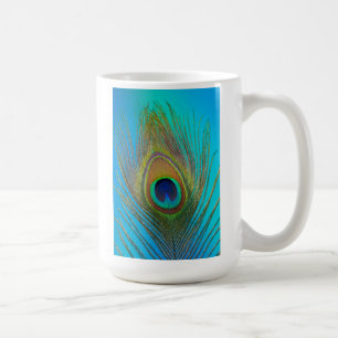Close up of peacock feather coffee mug