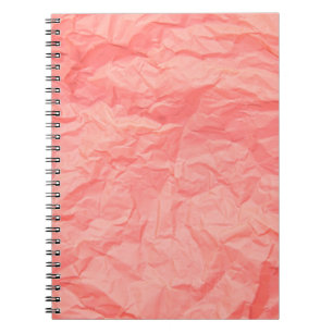 Close up of pink wrinkle crumpled old with paper p notebook